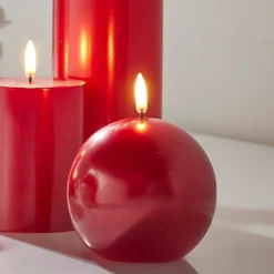 Raz Imports Raz 4" Uyuni Metallic Red Round Battery Operated Candle with Lighted Flickering Wick 4434528